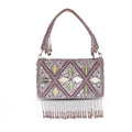 A pink embroidered clutch bag with a geometric pattern and a tassel detail on the front.