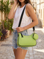 Woman carrying green Bili denim sling bag crossbody style for everyday casual wear
