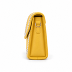 Side profile of the Purpleberry Riva yellow sling bag with a gold-tone strap ring