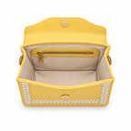 Beige lining and interior zip pocket inside the Purpleberry Riva yellow sling bag