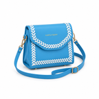 A bright blue faux leather shoulder bag with white embroidered chevron borders and gold hardware, featuring the brand name 'PURPLE BERRY' in gold on the front flap.