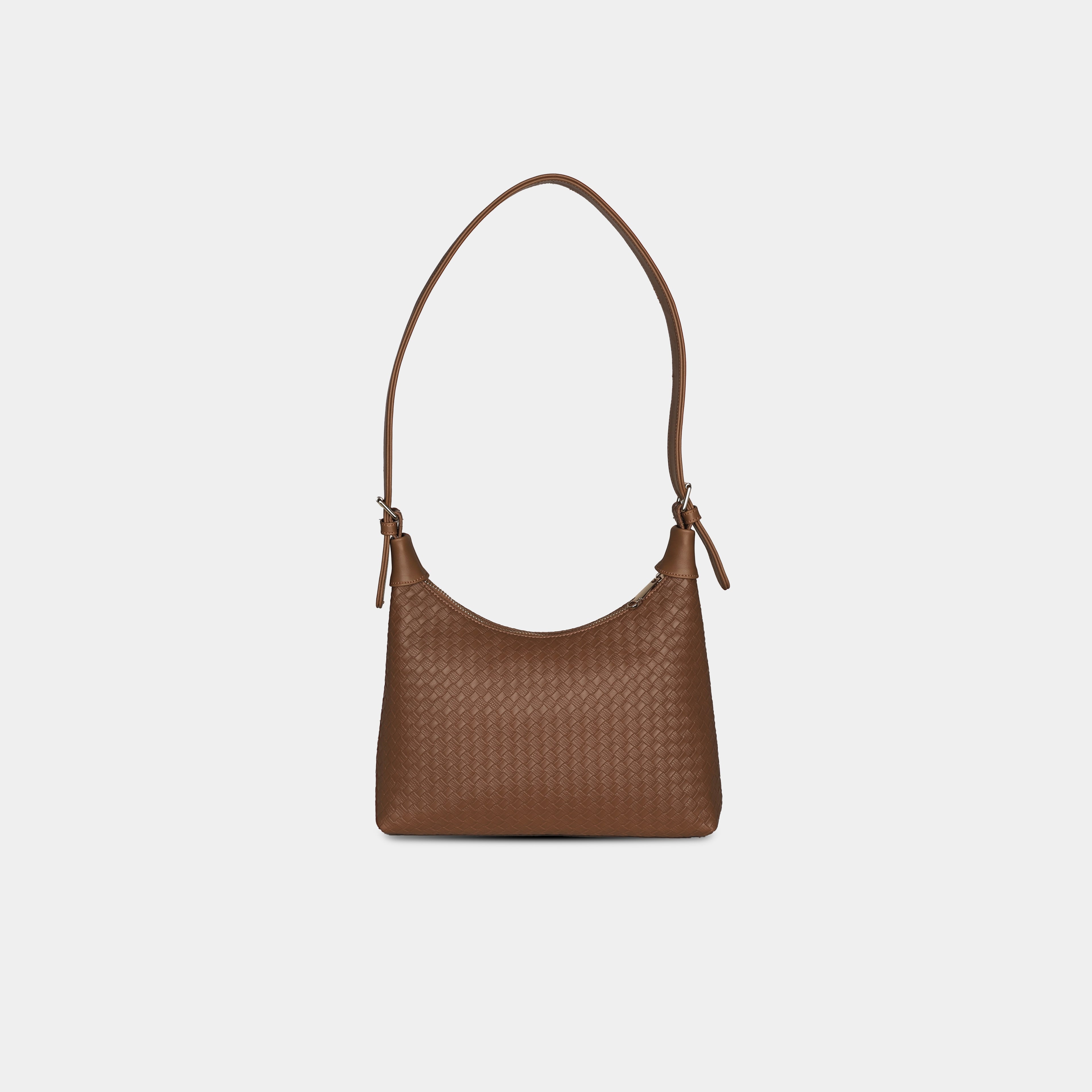 Back profile of dark brown Ananta woven shoulder bag with curved silhouette