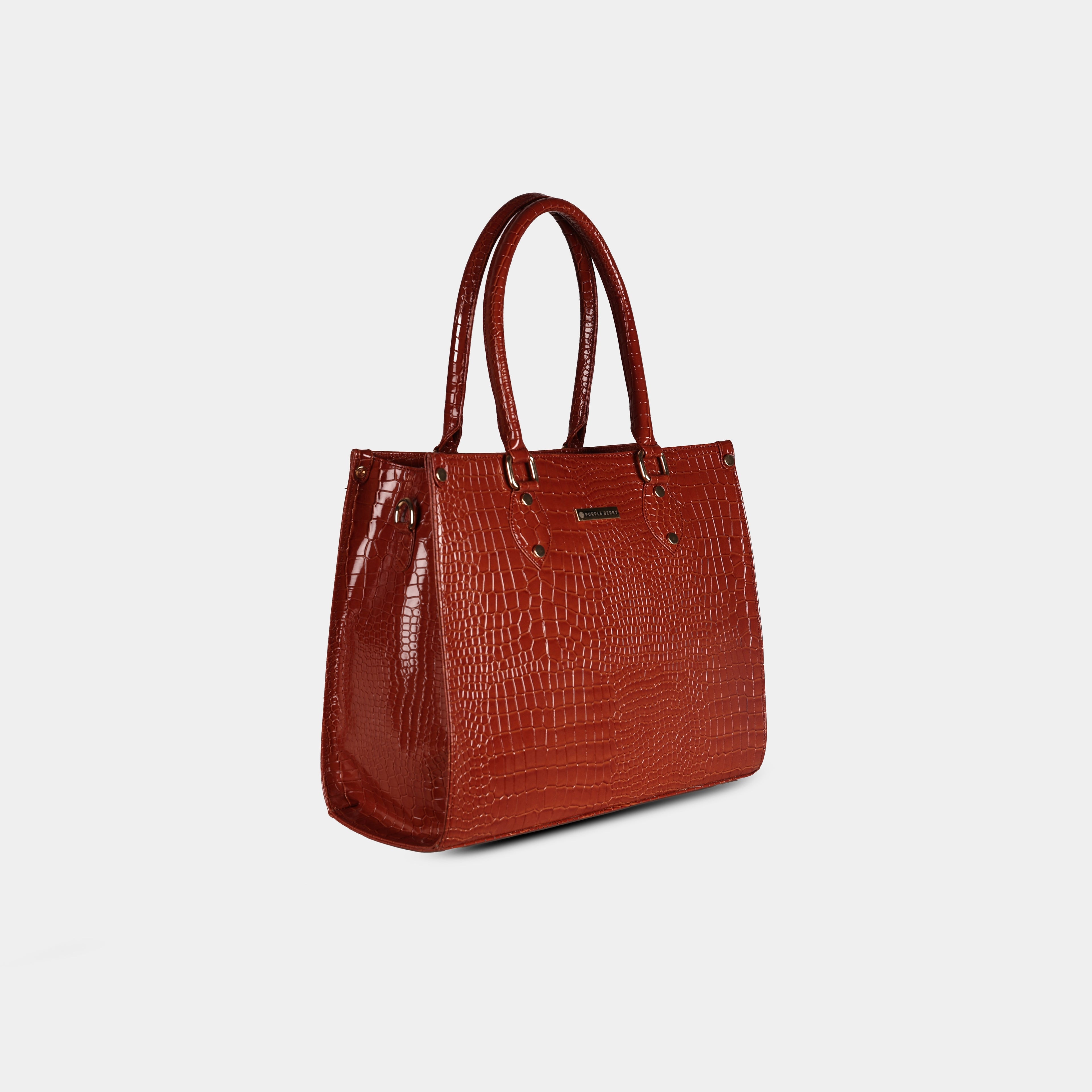 Side profile of red snake-textured handbag highlighting structured body and detachable strap attachment