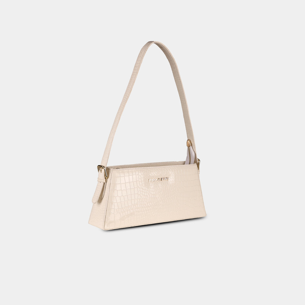 Beige Cosmo structured baguette bag – angled perspective
