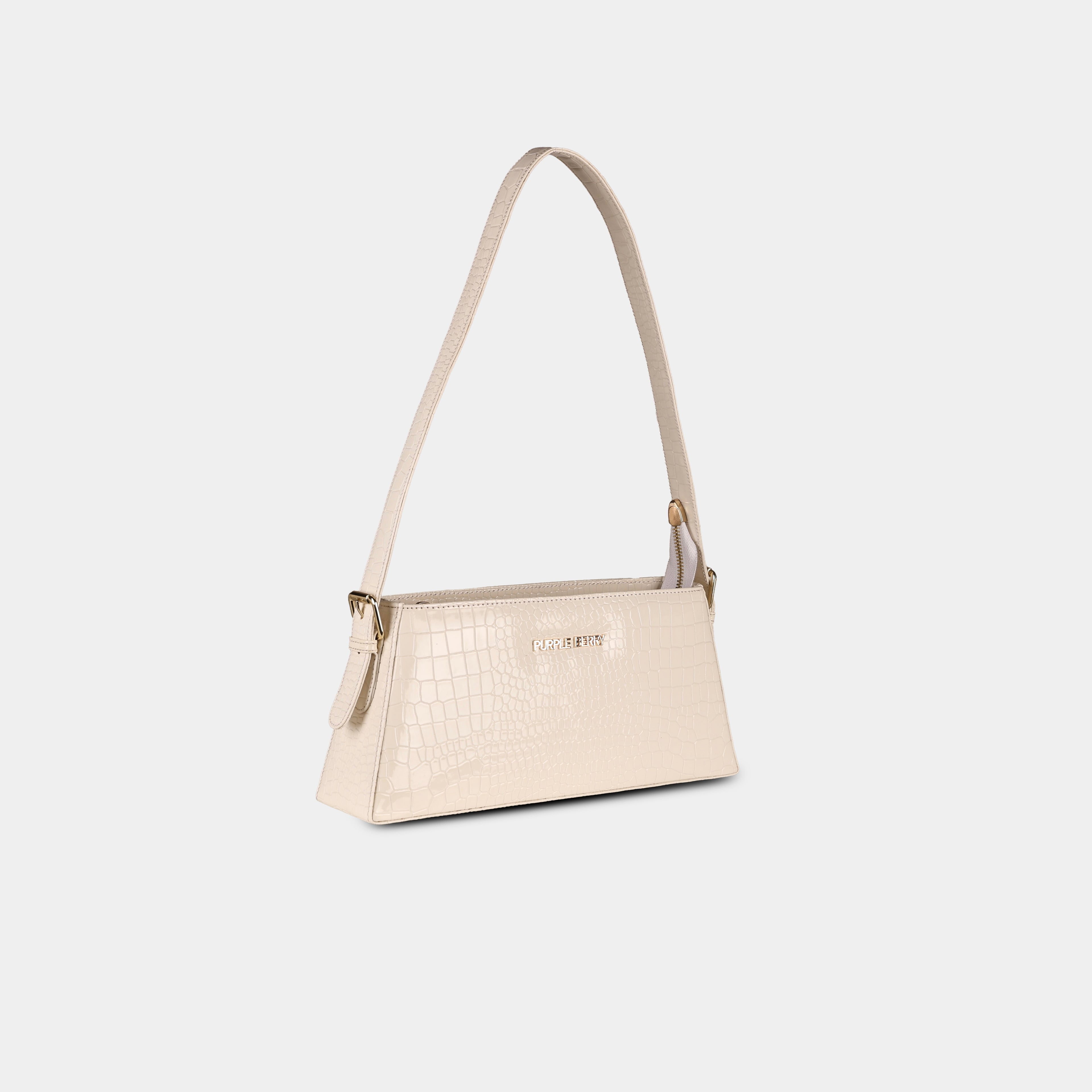 Beige Cosmo structured baguette bag – angled perspective