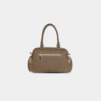 Back zipper pocket of brown Frida denim sling bag