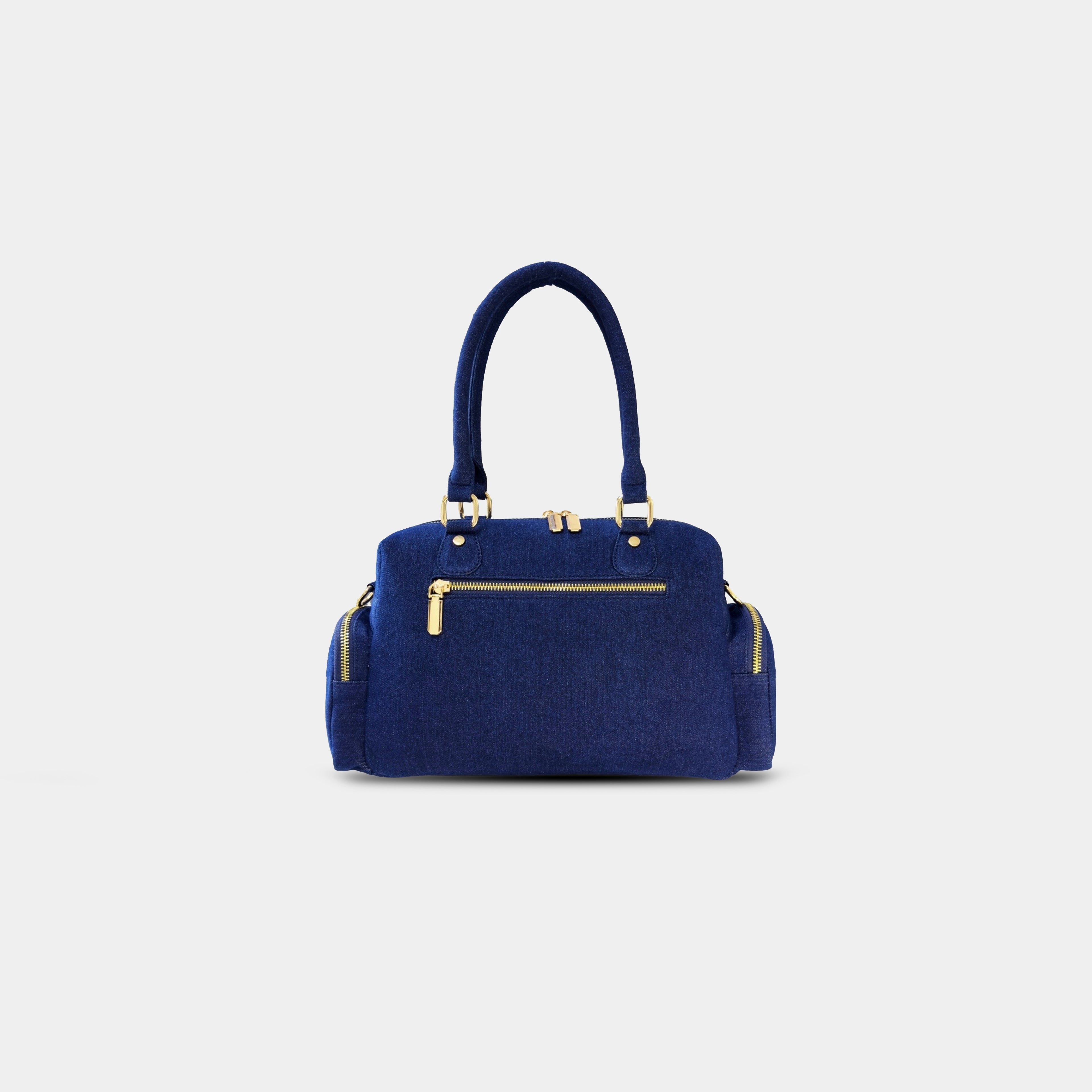 Back zipper pocket view of dark blue Frida sling bag