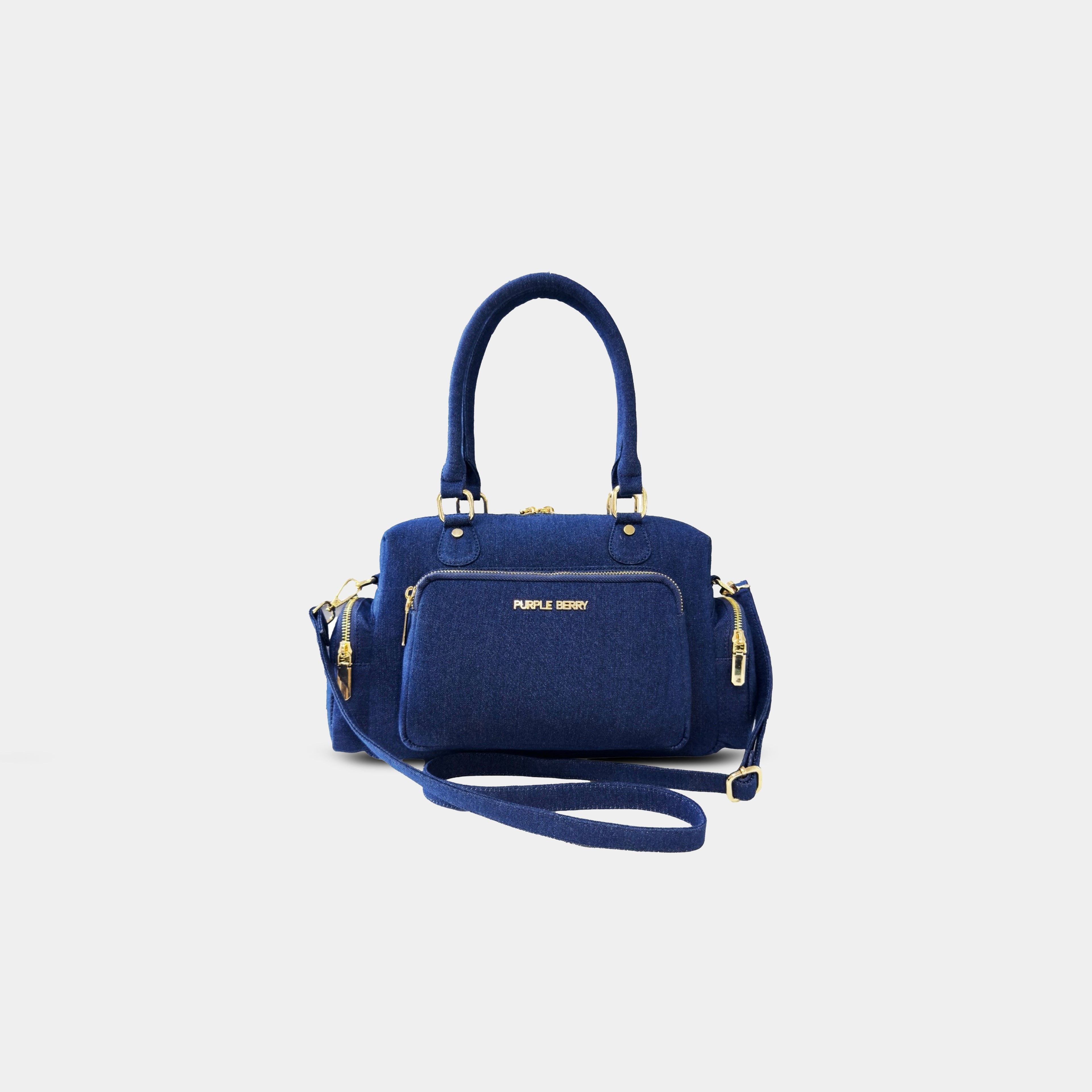 Dark blue Frida sling bag showing front zipper pocket