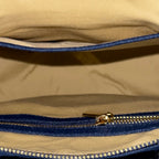 Interior compartment of dark blue Frida denim sling bag