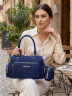 Model wearing dark blue Frida denim sling bag
