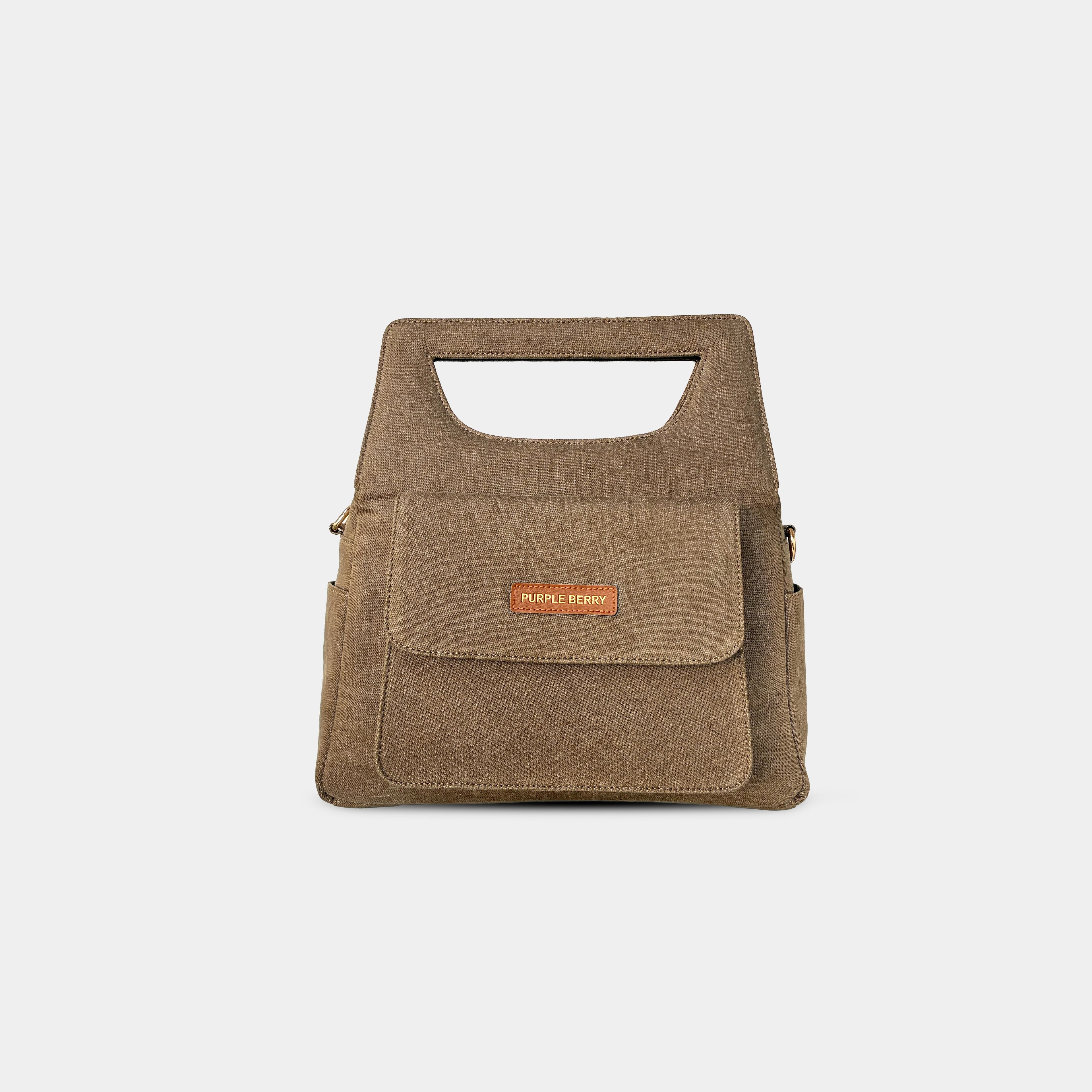 Front magnetic flap pocket on brown Hera handbag