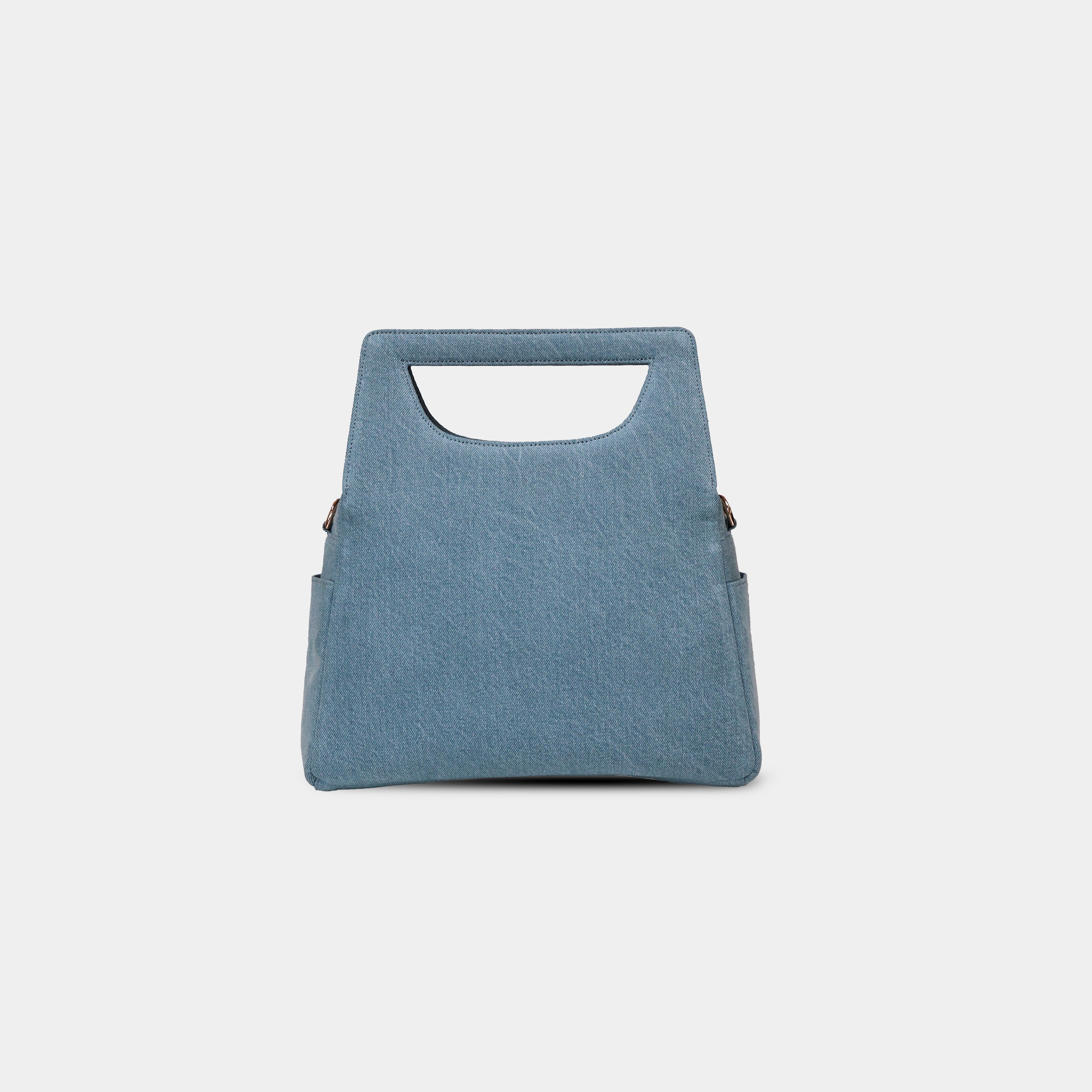 Back view of Hera light blue denim handbag with smooth rear panel