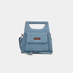  Hera Denim Handbag in light blue with integrated cut-out top handle