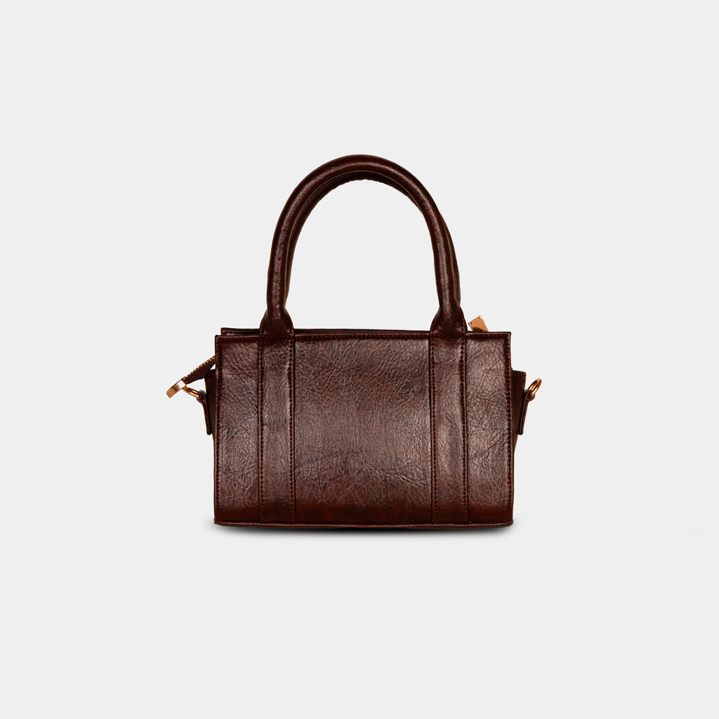 Back view of dark brown Lumière mini party bag showing structured silhouette