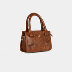 Light brown Lumière mini structured party bag with gold hardware – angled view
