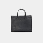 Black anie tote Back view showing trolley sleeve for travel 