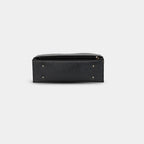 Anie tote Bottom base view of black vegan leather work bag