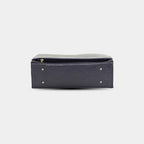 Purpleberry Bottom base of blue vegan leather work bag