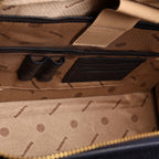 Built-in pen holders inside blue office tote bag