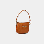 Side profile of Purpleberry Aria orange croc embossed mini party bag showing slim structure