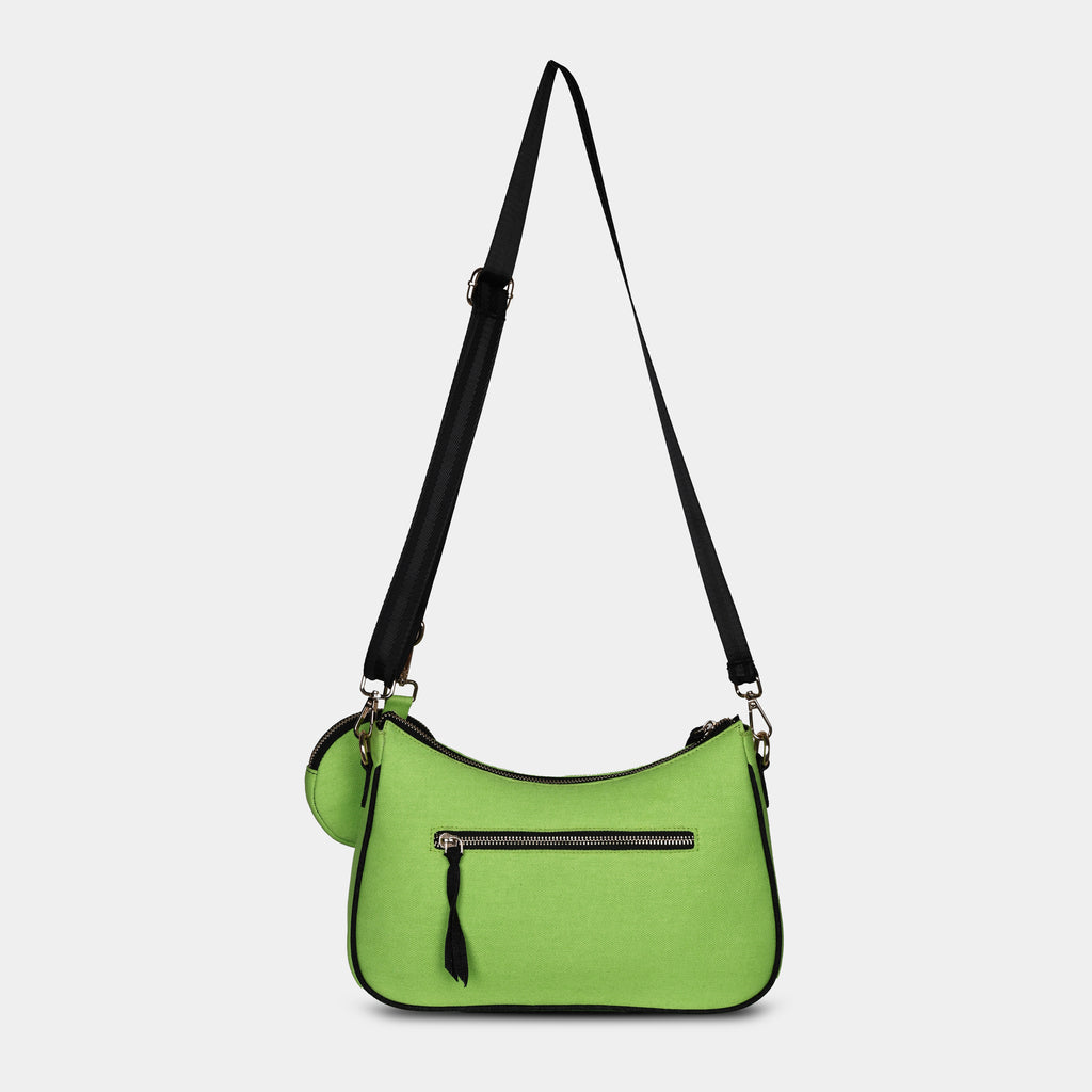 Back view of green Bili denim sling bag featuring secure zipper pocket