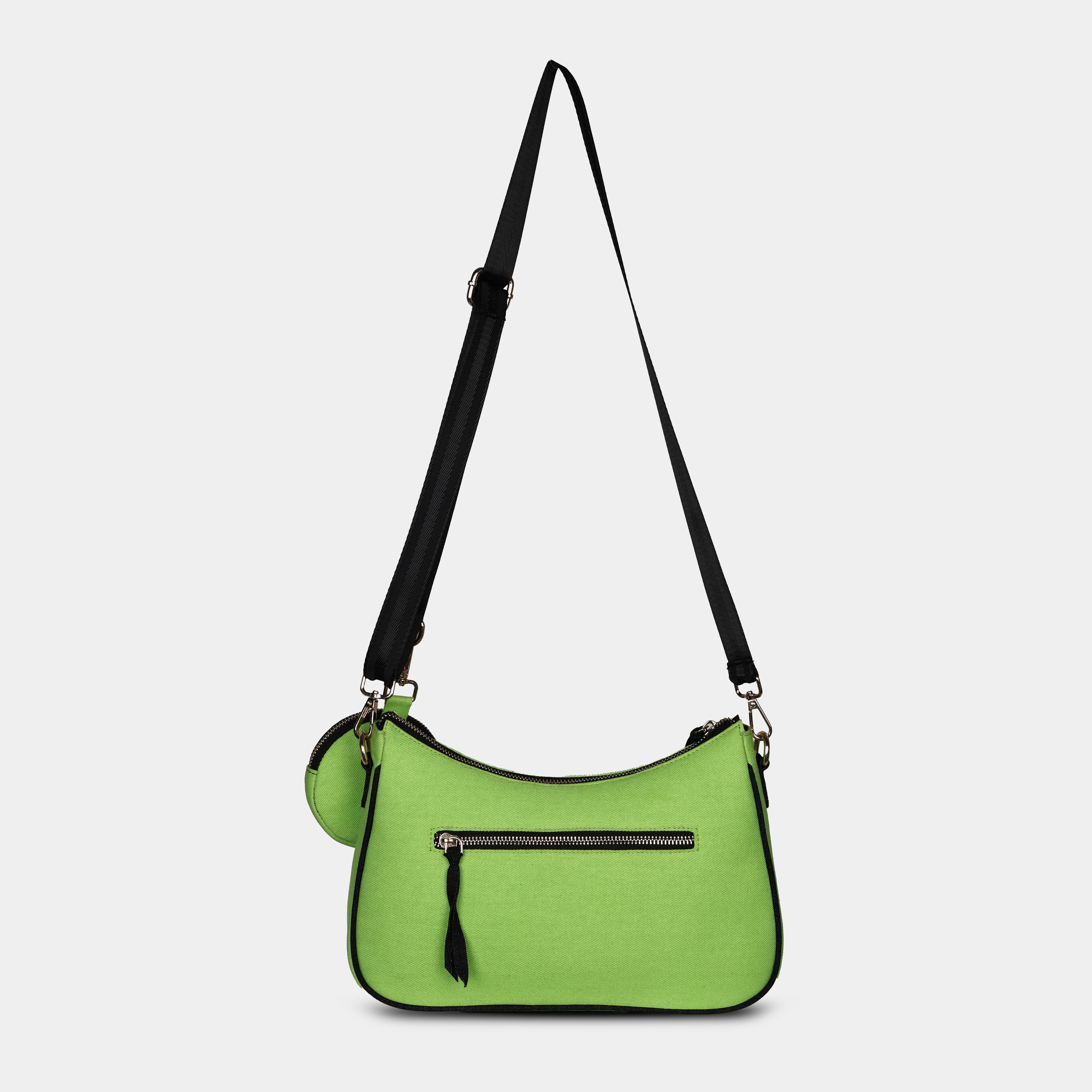 Back view of green Bili denim sling bag featuring secure zipper pocket