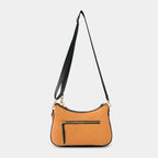 Back side of orange Bili denim sling bag showing zipper pocket and stitching details