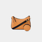 Orange Bili denim sling bag with matching detachable coin pouch and adjustable strap