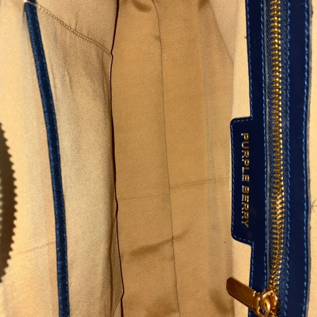 Back view of dark blue Dima tote with zipper pocket