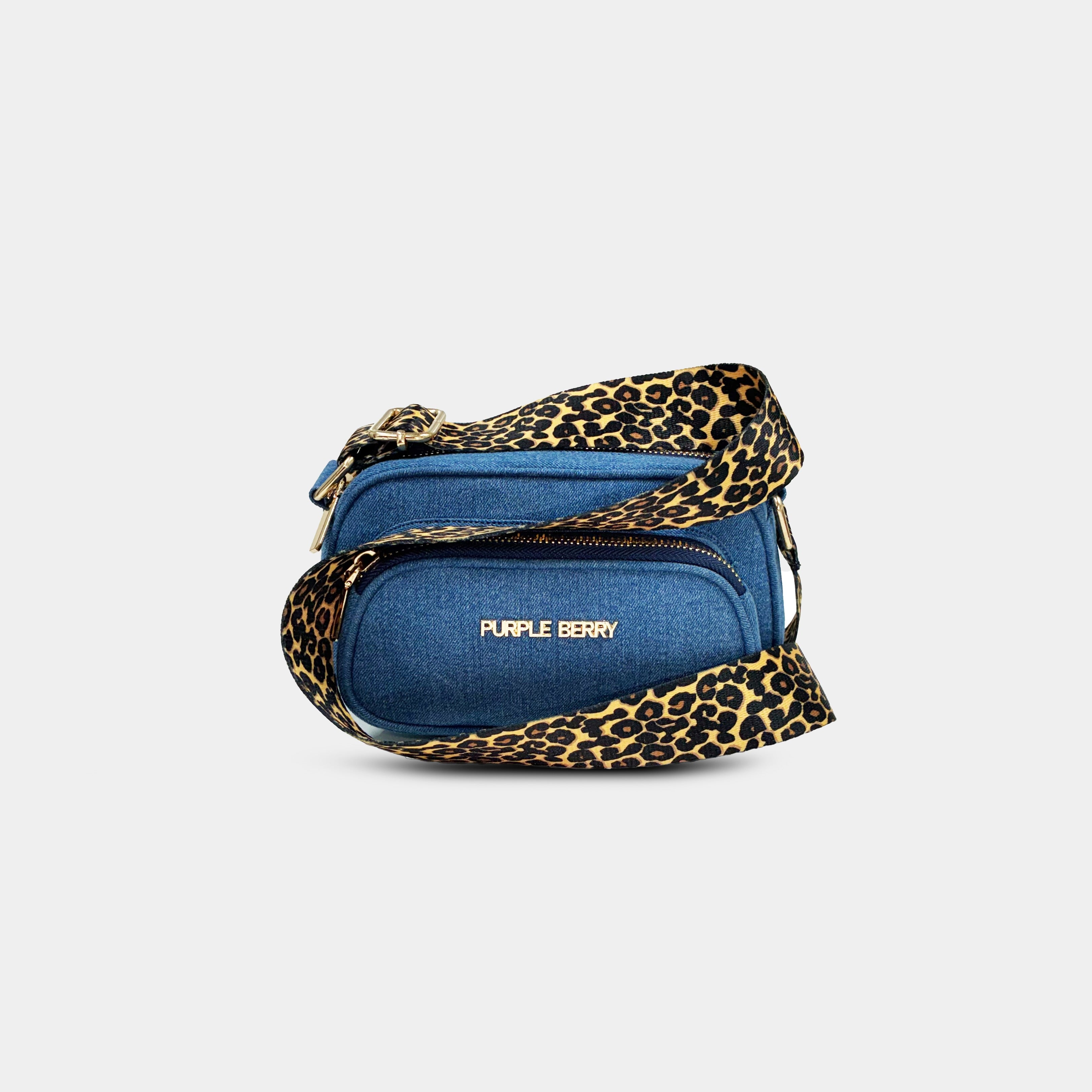 Purpleberry Fehu denim sling bag in classic blue with leopard print strap front view