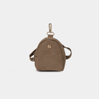Purpleberry Indigo micro backpack pouch in brown denim front view