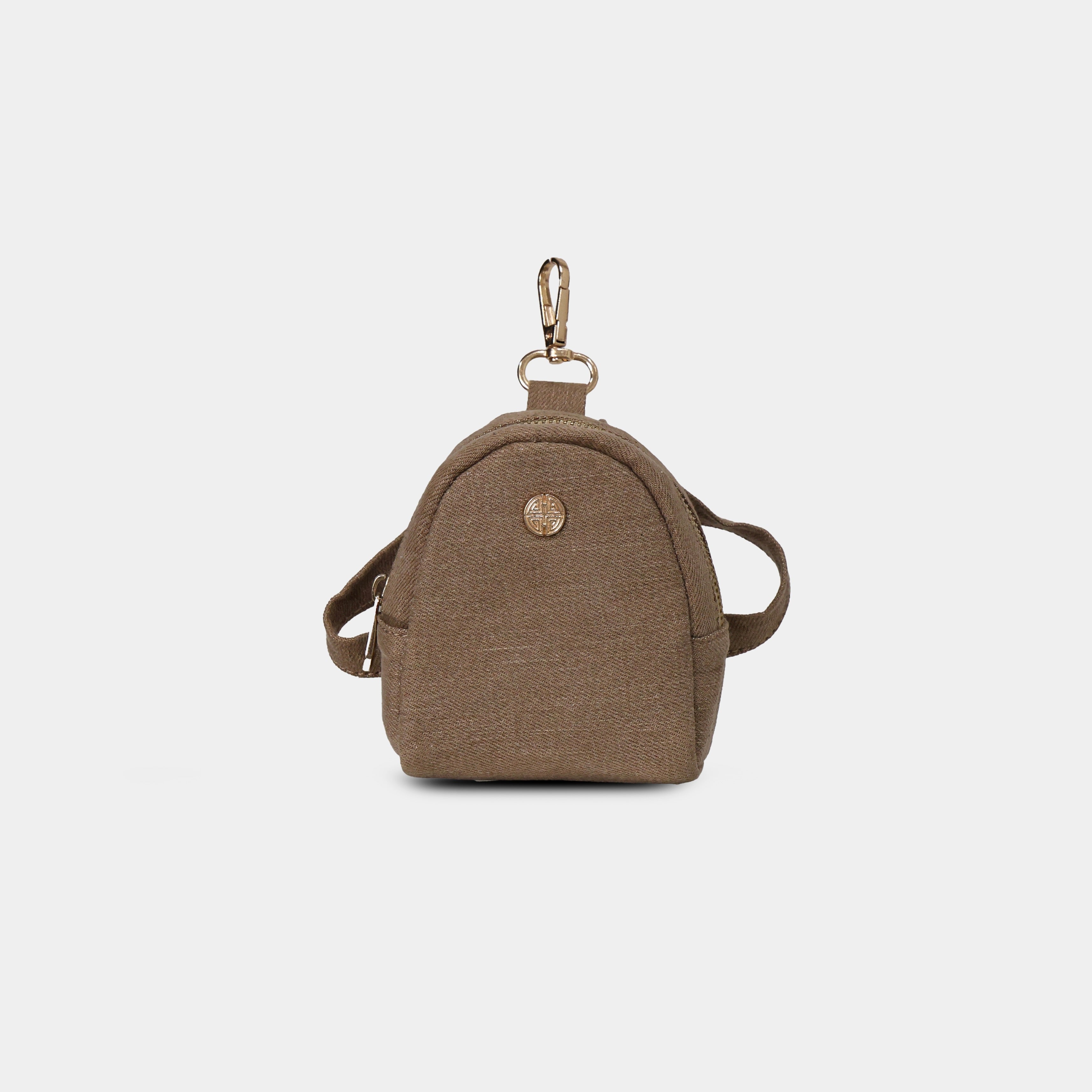 Purpleberry Indigo micro backpack pouch in brown denim front view