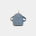 Purpleberry Indigo micro backpack pouch in light blue denim front view