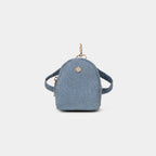 Purpleberry Indigo micro backpack pouch in light blue denim front view