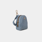 Side profile of Purpleberry Indigo light blue denim micro backpack pouch