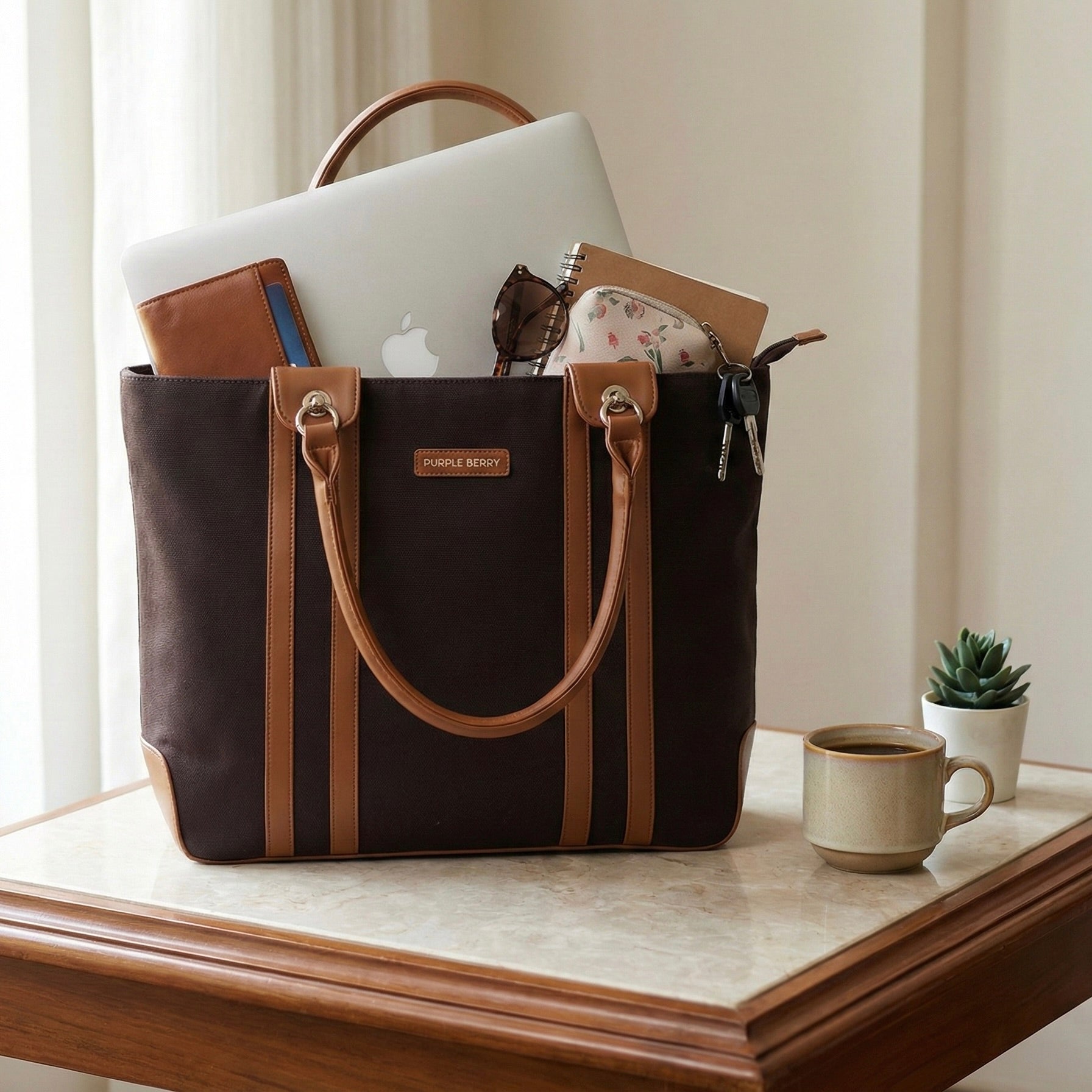 Brown canvas tote fitting a 15.5 inch laptop comfortably