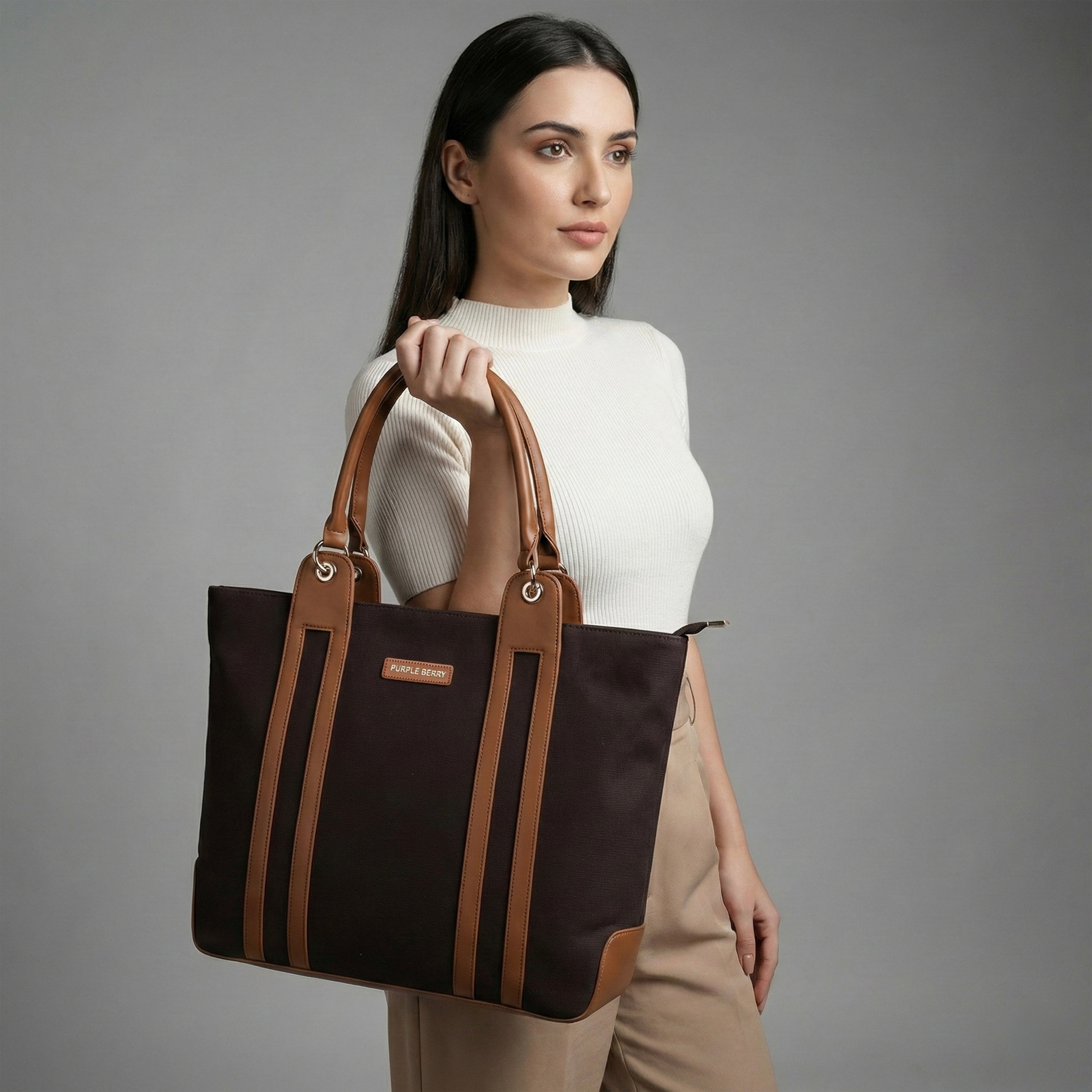 Women holding a Premium canvas texture detail of brown Infinity work tote bag