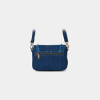 Back zipper pocket detail of Purpleberry Luna blue denim sling bag