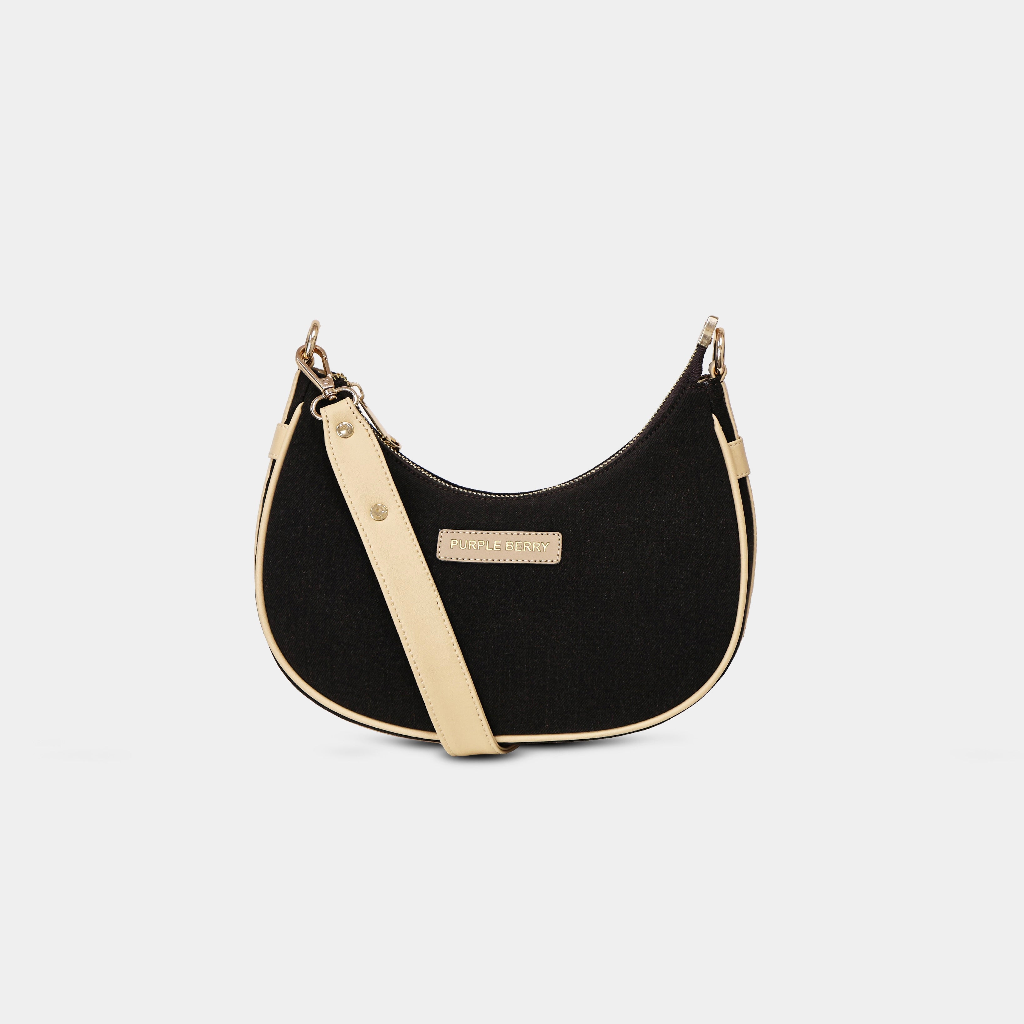 Purpleberry Moda black denim crescent sling bag with beige trim front view