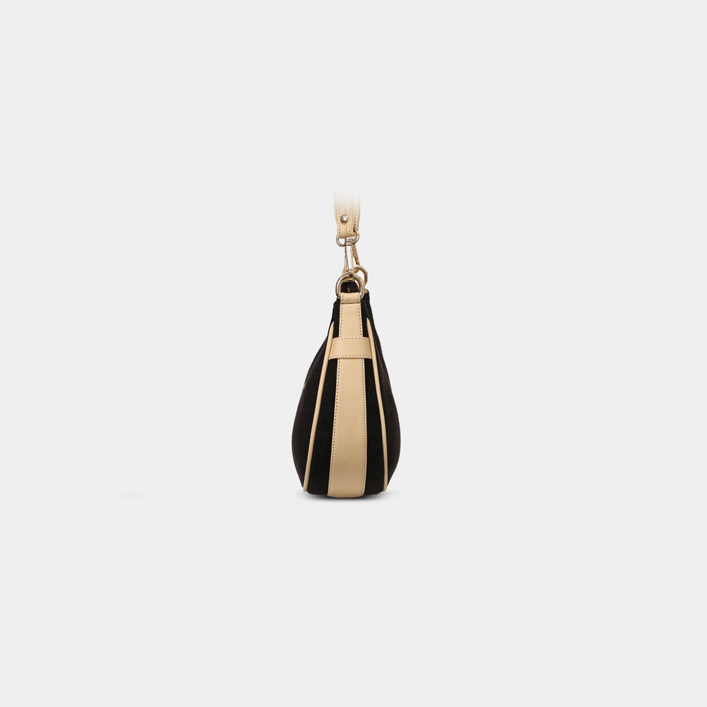 Side profile of Purpleberry Moda black crescent denim shoulder bag