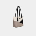 Side profile of a multicolor Prism canvas handbag showing structured shape and canvas thickness