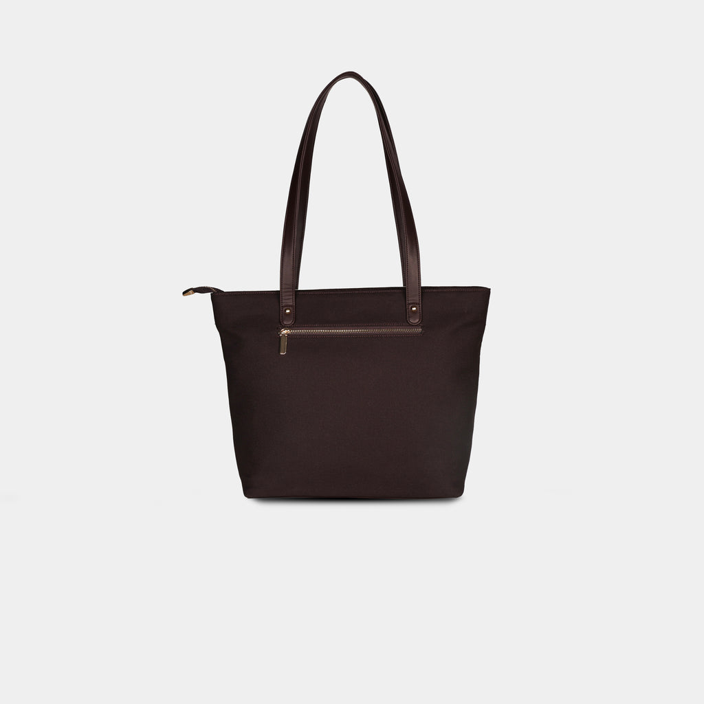 Rear side of multicolor Prism tote showing zipper pocket and structured panel stitching