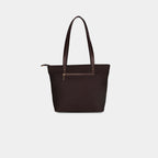 Rear side of multicolor Prism tote showing zipper pocket and structured panel stitching