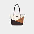 Front view of Prism multicolor canvas geometric tote showing angular panel design and dual straps
