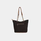 Rear zipper pocket detail on dark espresso star handbag