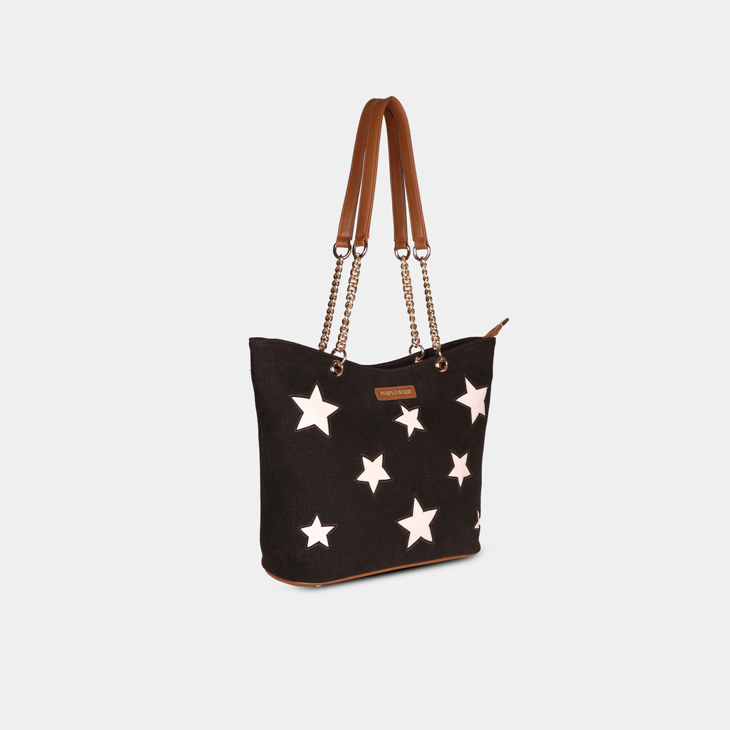 Side angle of dark espresso canvas handbag with gold chain straps