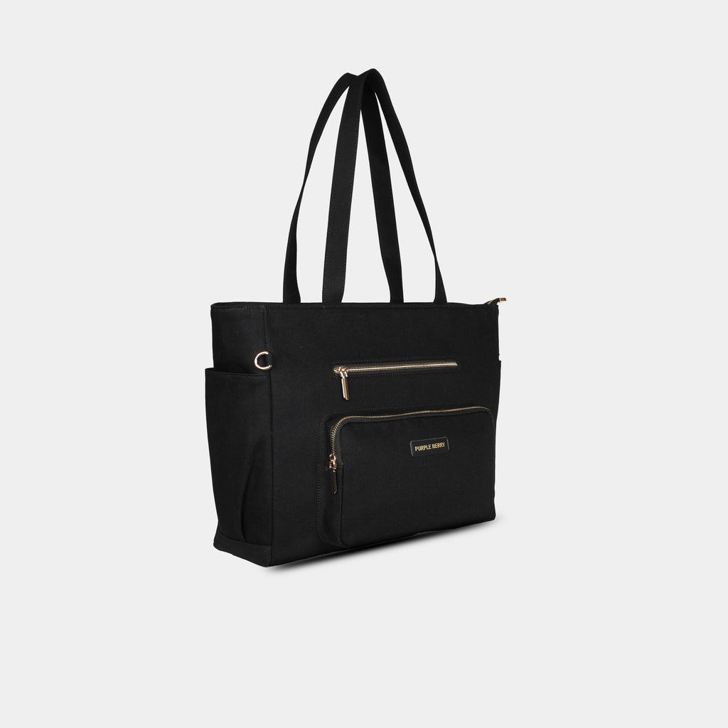 Side angle of black large size canvas tote showing depth and structure