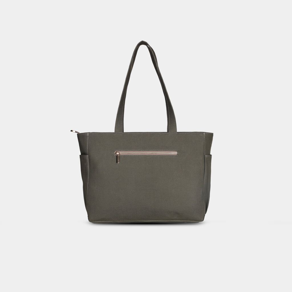 Back zipper pocket detail on olive green canvas tote