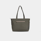 Back zipper pocket detail on olive green canvas tote