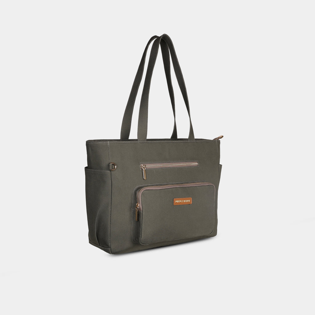 Side profile of olive green canvas tote showing wide base